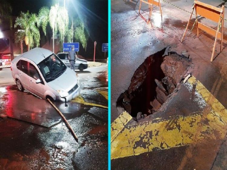 Carro e moto caem em buraco após rompimento de tubulação de água